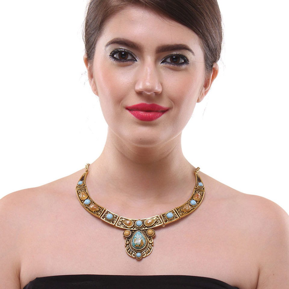 golden necklace with blue stone for women